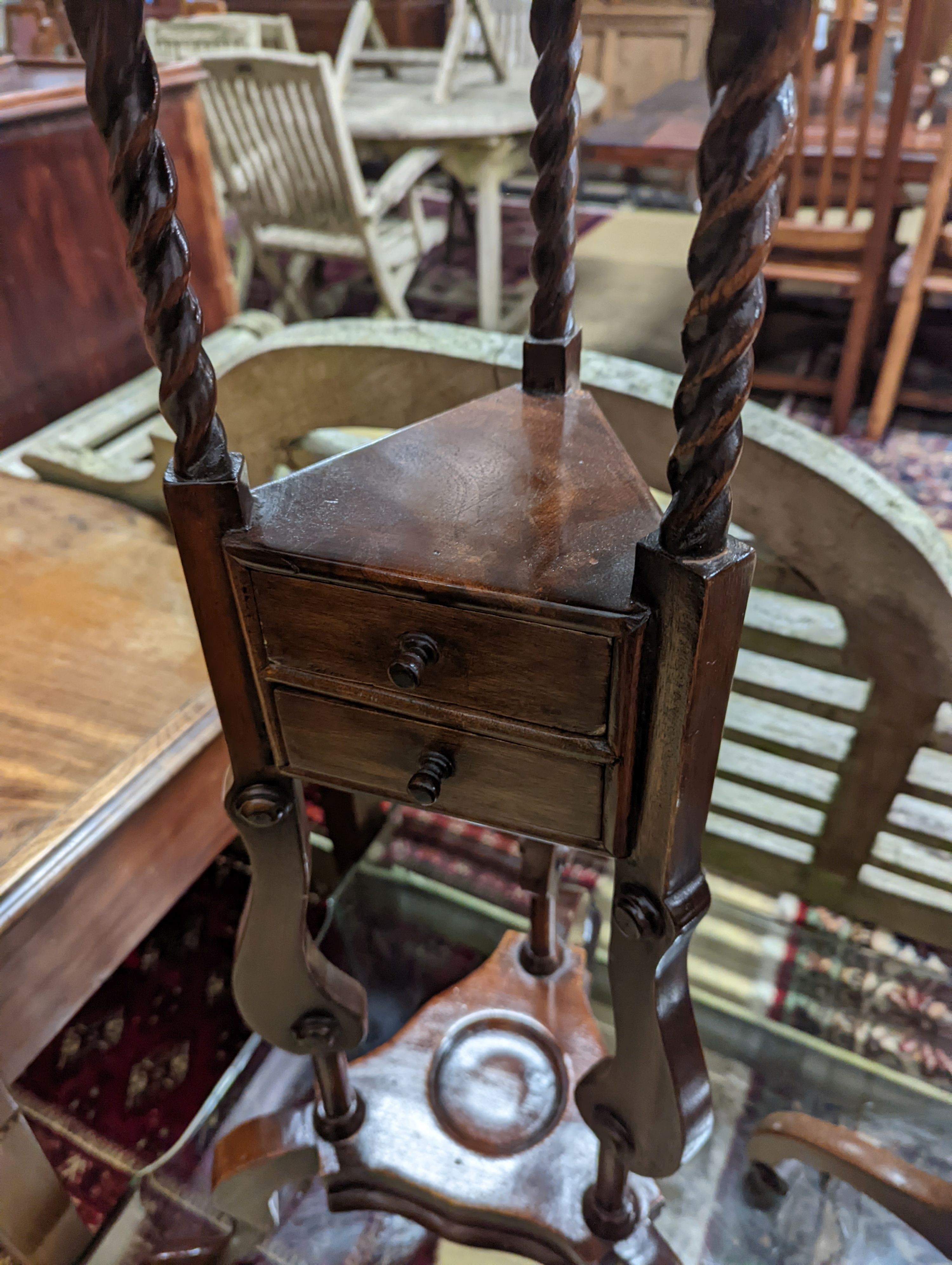 A George I style yew and walnut tripod candlestand, height 97cm, together with one other and a reproduction wash stand